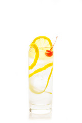 Traditional Tom collins cocktail isolated on white background. Selective focus. Shallow depth of field.