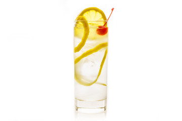 Traditional Tom collins cocktail isolated on white background. Selective focus. Shallow depth of...