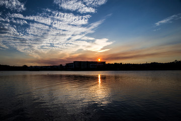 Beautiful Sunset sits on the lake