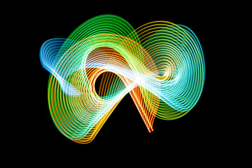 Colorful blue, yellow, green and orange  neon  spiral lines.Abstract background of blue neon...