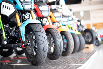 Motorcycle business, background, motorcycle showroom, blurry abstract, blurred background and can...