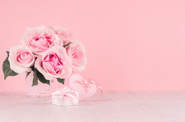 Romance celebration background for Valentine and wedding - luxury roses bouquet, cute gift box,  heart with silk ribbon on white wood board, copy space.