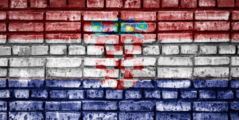 National flag of Croatia on a brick background. Concept image for Croatia: language , people and culture.
