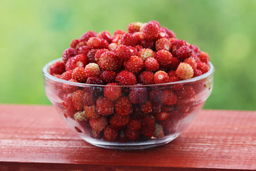 A cup with ripe strawberry
