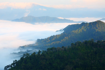 Beautiful sunrise of the sea foggy with mountains range in the Kaeng Krachan National Park at...