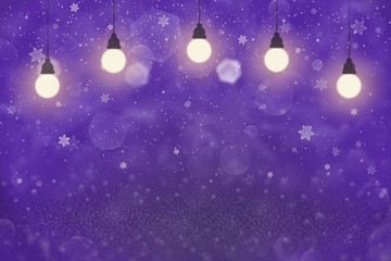Fototapeta na wymiar purple nice shining glitter lights defocused bokeh abstract background with light bulbs and falling snow flakes fly, festival mockup texture with blank space for your content