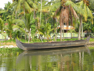 Boat anchored on backwaterы in Kerala, Kochi
