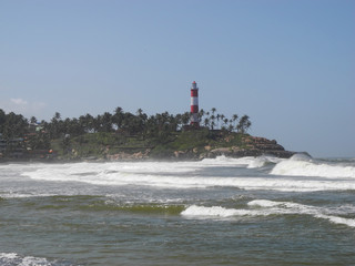 Kovalam bay in the Arabian Sea, Indian Ocean, Kerala, Trivandrum district. View of the lighthouse