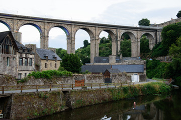 Fototapeta premium Viaduct over old village and river in Dinan