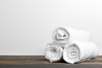 Obraz na płótnie Canvas Clean soft towels on wooden table