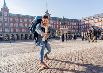 Happy student having fun in Madrid, Spain Europe. In surfing the world concept