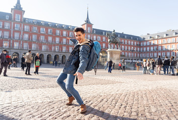 Happy student having fun in Madrid, Spain Europe. In surfing the world concept