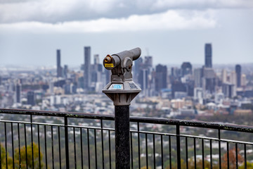 Coin - operated binoculars overlooking the Brisbane city from Mount Coot-tha lookout