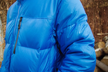 Male model in winter blue jacket posing