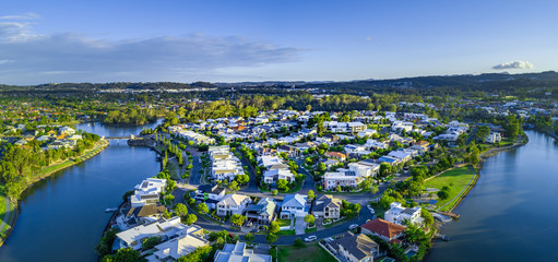 Aerial panorama of Reedy creek and luxury houses. Varsity Lakes, Gold Coast, Queensland, Australia