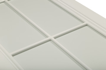 Detail close-up of a white frame facade for the kitchen.