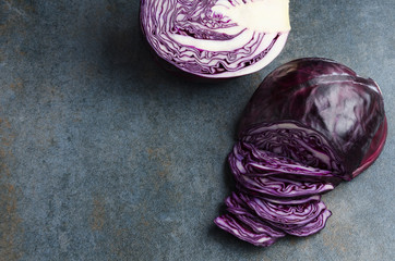 Process of chop of red cabbage on grey surface.Slaw cabbage