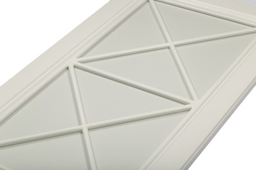 Detail close-up of a white frame facade for the kitchen.