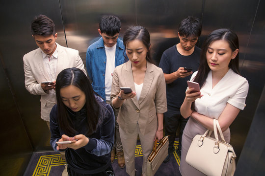 Young men and women of the elevator