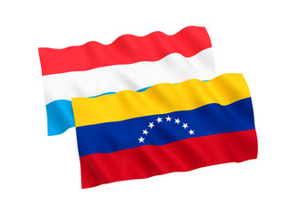 National fabric flags of Venezuela and Luxembourg isolated on white background. 3d rendering illustration. 1 to 2 proportion.