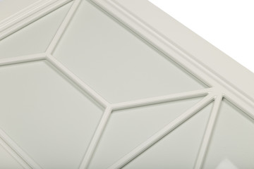 Detail close-up of a white frame facade for the kitchen.