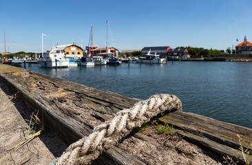 rope of fishing boats in harbor
