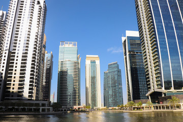 Obraz na płótnie Canvas Scenic view with skyscrapers of the Jumeirah Lakes Towers, Dubai Skyline, UAE