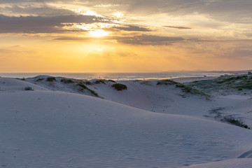 White sand dunes of Birubi beach at sunset. Anna Bay, New South Wales, Australia