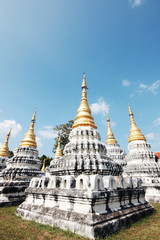 Fototapeta premium Golden pagoda at Wat Prathat Lampang Luang temple located in Lampang Province, Thailand.