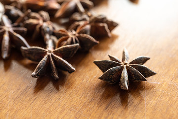 Macro of star anise on wooden table