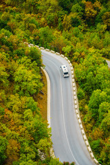 Camper car on road in mountains Meteora Greece