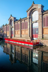 Traditional market in romantic Colmar in France during winter time.
