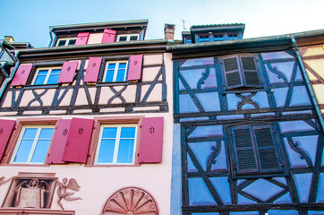 Traditional colorful buildings with windows in french Alsace, Colmar