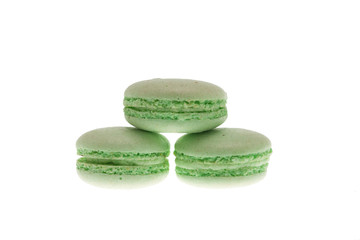 Sweet green macaroons isolated over white background