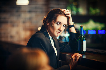 Woman is pretending to be a man