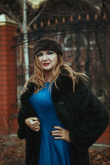 Lady is posing wearing Russian style