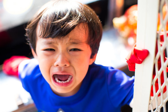 Little Asian Boy Crying Bitterly