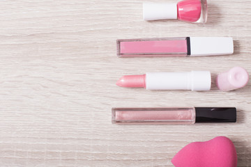 female pink cosmetics, top view