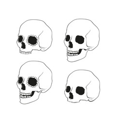 Icon set of isolated skulls in doodle style.