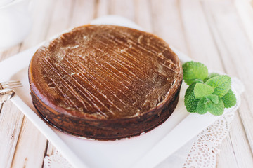 Chocolate cheese cake with mint. Photo for menu 