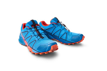 Front view of blue and Orange trainers isolated on a white background.