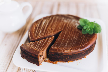 Chocolate cheese cake with mint. Photo for menu 