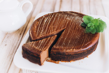 Chocolate cheese cake with mint. Photo for menu 