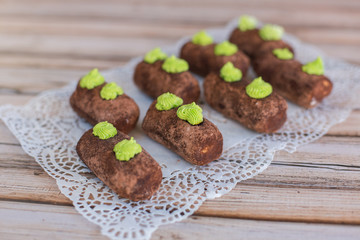 Baked sugar food dessert on wooden plate. Cookies and pastry