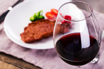 Glass of red wine and meal