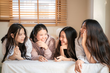 Group of women friend tell scret and laughing together