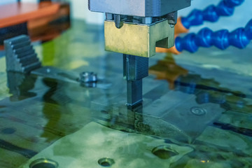 EDM Machine in runing working on job