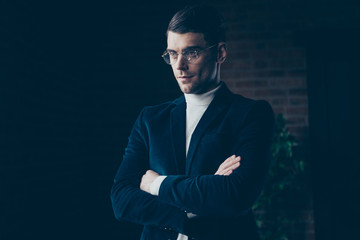 Portrait of his he nice handsome imposing stylish trendy intelligent minded guy financier economist realtor assistant folded arms at industrial loft interior workplace workspace