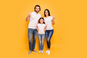 Full length body size view portrait of nice sweet lovely attractive adorable charming cheerful people mom dad pre-teen girl showing v-sign isolated over shine vivid pastel yellow background