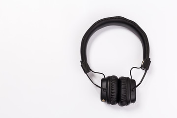 Black headphones on white background
